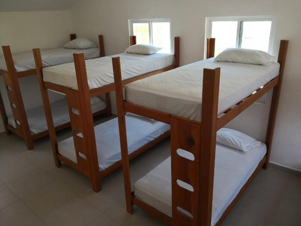Multiple bunk beds in Punta Sam Hostel.